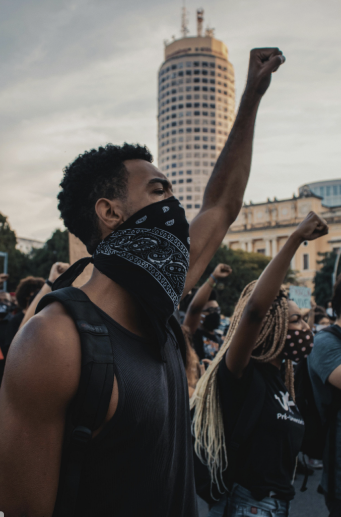 black protester with fist in the air