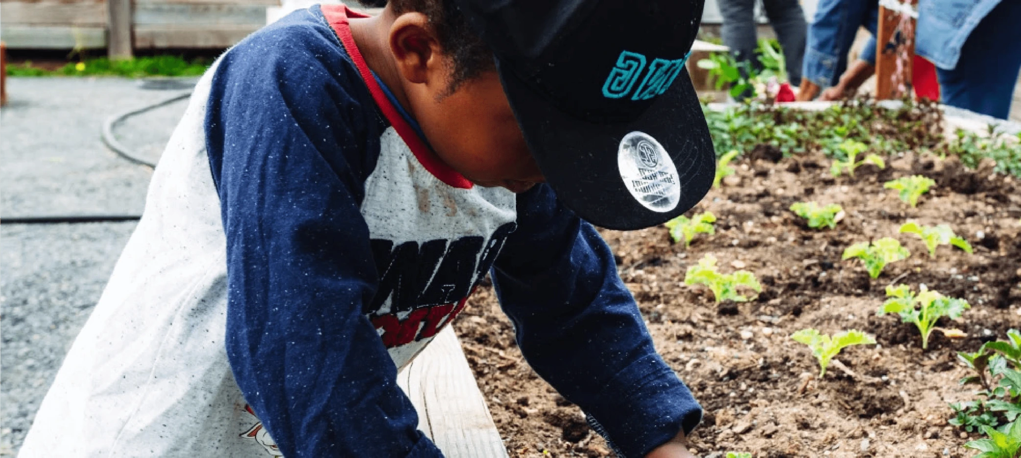 child planting