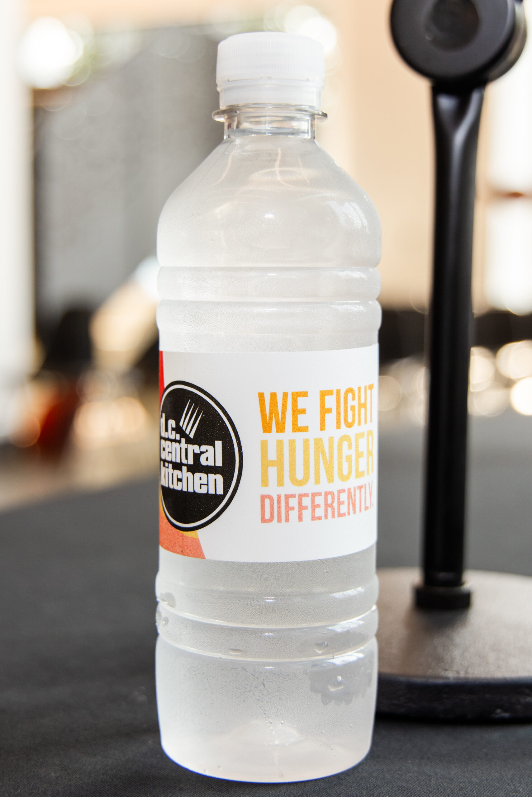 water bottle with the words "we fight hunger" written on it and a DC Central Kitchen logo